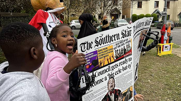 Isaac Olamide Dada and Diamond Kanyinsola Ojo from Clonakilty enjoying the Star scarecrow in Leap.