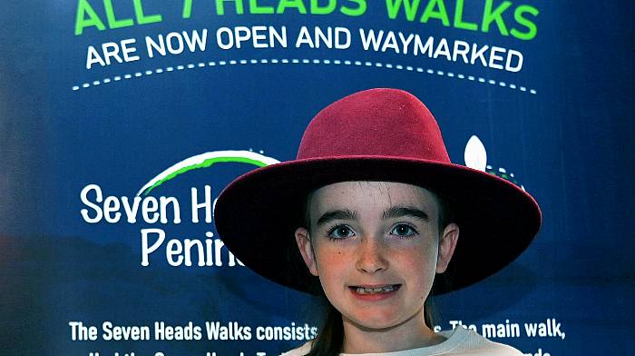 Aoibhinn O’Sullivan, Courtmacsherry, wearing her grandfather’s hat at the recent Seven Heads Walks annual fundraising breakfast in Courtmacsherry Hotel. The event is the main fundraiser for the upkeep and development of the popular walks.  (Photo: Martin Walsh)