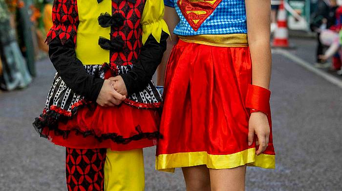 Charlotte O'Sullivan as the Joker and Sophie Humston as Superwoman, both from Skibbereen, enjoying the Halloween street party which took place in Skibbereen. (Photo: Andy Gibson)