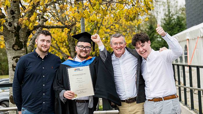 Rian Twomey celebrating with his family, Barra (brother), Larry (dad), and Tomás (brother), all from Ballingeary, at his conferring ceremony at MTU Bishopstown Campus where he graduated with a bachelor of business (honours) in accounting.  (Photo: Joleen Cronin)