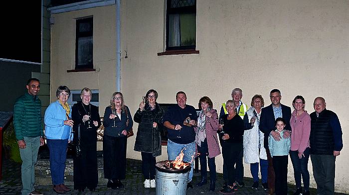 Celebrating Timoleague’s success at this year’s SuperValu Tidy Towns Competition were (left to right): Hannon Abdul, Mary McSweeney, Margaret O’Callaghan, Ann McCarthy, Mary Crowley, Ned Long, Catherine Ryan, Sheila Walton, Liam Ryan, Mary O’Mahony, Cllr John Michael Foley, Catherine Foley, Denise Foley and Sean O’Mahony.  (Photo: Martin Walsh)