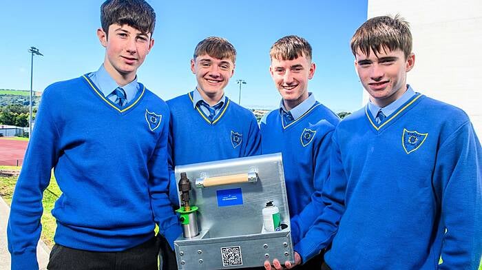 KCS 5th Year students Seán Dinneen,  David Forde,  John Quinn and Jack Good with the Farm Equipment Holder they developed while in Transition Year. Their ingenuity was rewarded with a monthly award in The Southern Star and Celtic Ross West Cork Farming Awards this year. (Photo: John Allen)