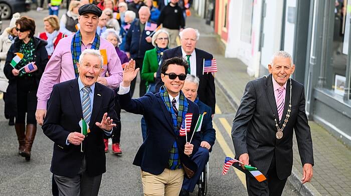 Xay Khamsyvoravong, Mayor of Newport, Rhode Island with Dermot Collins, former councillor and member of the original twinning committee and Cllr Kevin Murphy, then Deputy Chair of the Bandon Kinsale District during a parade in Kinsale to celebrate the 25th anniversary of the twinning agreement.