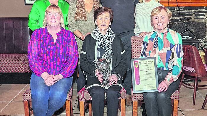 Celebrating receiving the prestigious County Mayor’s Award on behalf of the Dunmanway Christmas Day Swim fundraiser were (front, from left): Karen O’Donovan, Kathleen O’Farrell and Eileen Lyons. Back (from left): Maighread McCarthy, Laurie Hayes, Tim Buckley and Niamh Hayes.  (Photo: Noel M Photography)