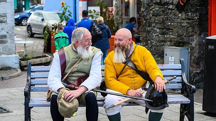 Paul Phelan and Paul Murphy from Lord Edwards Own reenactment group take a break in Kinsale in August during a living history display showcasing clothing, weapons, and drills from the Battle of Kinsale as part of the 424th anniversary event for the battle.
Picture. John Allen