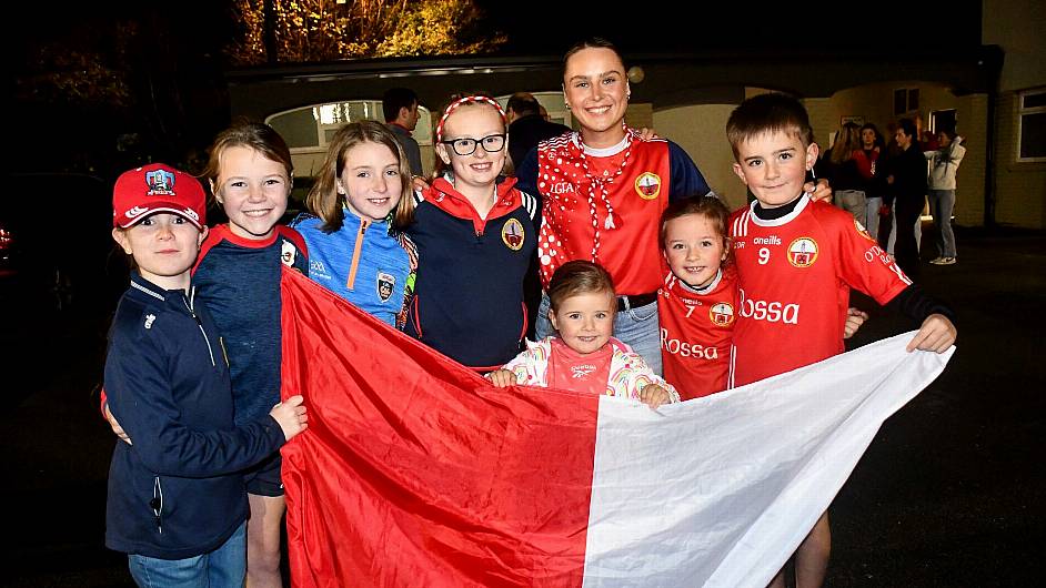 O'Donovan Rossa captain Laura O'Mahonwith supporters Saoirse Ward, Elena Tobin, Maeve Gough, Cara O'Donovan, Jake, Freya and Lottie Levis  after the team arrived back in Skibbereen following their Munster Championship success. (Photo: .  Anne Minhane)