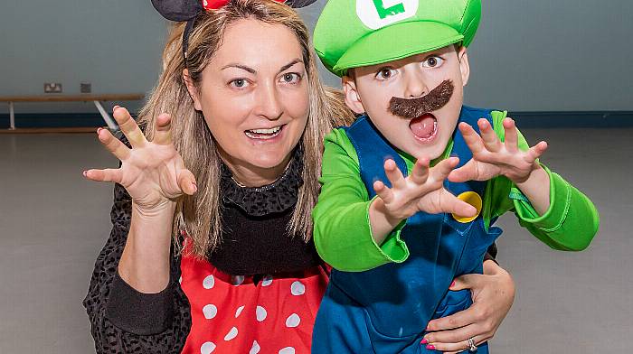 Jacinta O’Sullivan, with her son Dean O’Sullivan, enjoying the fancy dress at Scoil an Chroi Ro Naofa.  (Photo: Anne Marie Cronin)