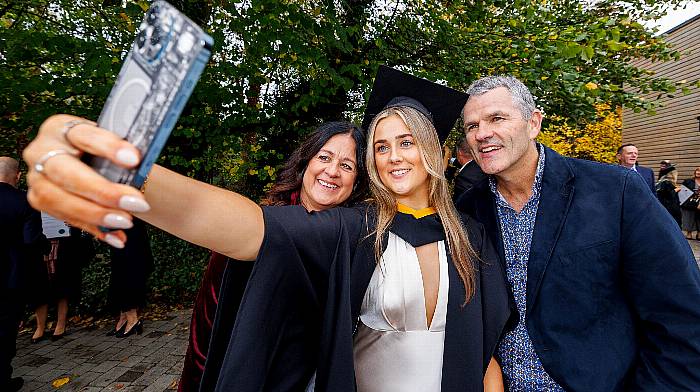 Claudia Keane from Tower with her parents Anne Marie Twomey and Kieran Keane at her conferring ceremony at Mary Immaculate College.  (Photo: Arthur Ellis)