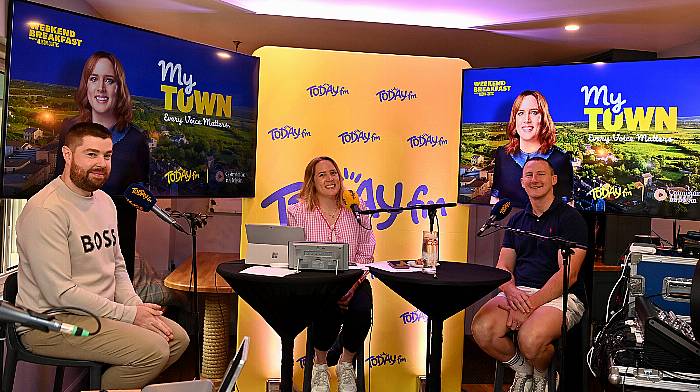 Proprietors of the Lifeboat Inn, Courtmacsherry Martin Buckley (left) and David O’Halloran with Alison Curtis of Today FM in a live broadcast from the Lifeboat Inn during the Courtmacsherry Harbour Festival last August.  (Photo: Martin Walsh)