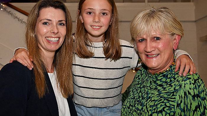 Alva Calnan (centre) with her mum Corinna (left) and her grandmother Mareeta, all from Bandon, at the Bandon camogie club’s fashion show which was held at the Bandon GAA pavilion in memory of Nicola Tobin. All proceeds from the night were in aid of The Alzheimer Society of Ireland and Marymount.                    (Photo: Martin Walsh)