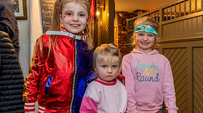 Union Hall, West Cork, Ireland. 31st Oct, 2024. A mild, clear Halloween night in Union Hall brought out many young people for trick or treating. Enjoying the night were Doireann, Sadie and Blaithin White, all from Union Hall. Picture: Andy Gibson.