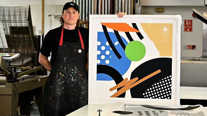 Local artist Shane O’Driscoll with his Team Ireland Olympic centenary print. He was the artist in residence for Team Ireland at the Paris Olympics in July.