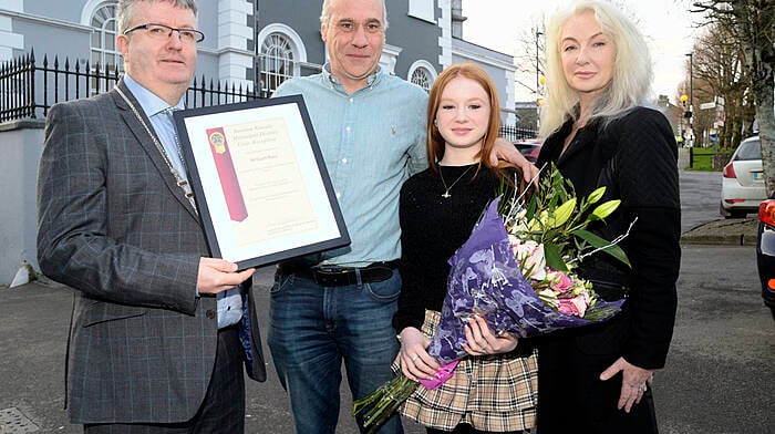 February: Local hero William Ross (second from left), who helped rescue a lady from her car after it had entered the River Lee in November 2023, was honoured at a special event hosted by Sean O’Donovan MCC (left). Also included are Sophia and Geraldine Ross (Photo: Denis Boyle)