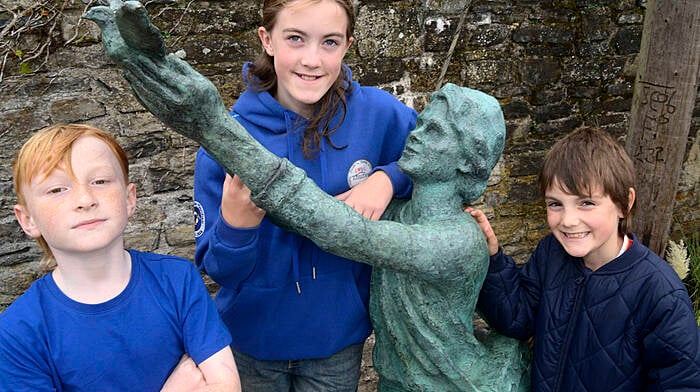 Pictured at the unveiling of a sculpture remembering the  forgotten Charter School children of Ireland at Innishannon  in October were school children Isacc Caplice, Ellie Angland and Tim Angland. Picture Denis Boyle