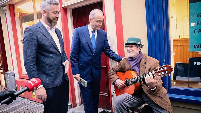 Tánaiste Micheál Martin and Christopher O'Sullivan TD with Christopher’s brother-in-law, Les, on the streets of Clonakilty last week.