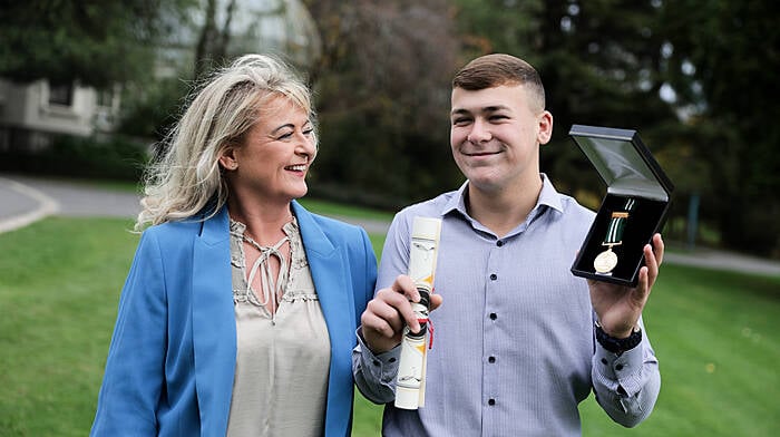 David Akar with his mum Pamela Cregan at the National Bravery Awards which were held at Farmleigh House in Dublin. David was awarded a gold medal and certificate of bravery when some friends he was swimming with at the Mariners Quay at Passage West got into difficulties in a strong current. David saved one by pushing him back to safety and tried tirelessly to save another, who unfortunately lost his life.   (Photo: Tony Maxwell)