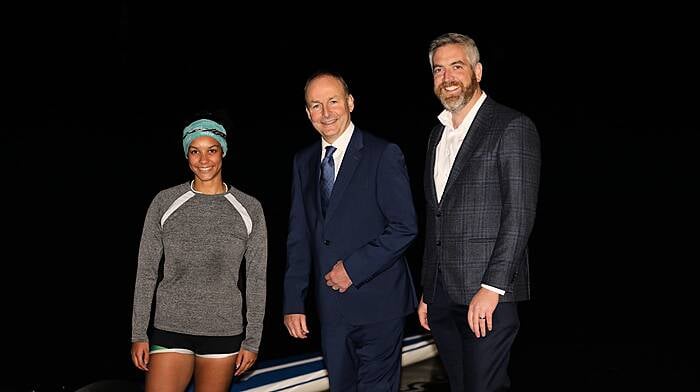 Skibbereen Rowing Club’s Kelly O’Donovan with Tánaiste Micheál Martin and Christopher O'Sullivan TD, when they visited the club last week.