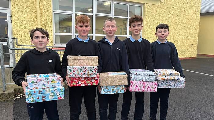 Pupils from Bishop Galvin Central School collected items for the Team Hope Christmas Shoebox Appeal that delivers gifts into the hands of children affected by poverty and war. From left:  Michael Walsh, Darragh Sleator, Andrew O’Callaghan, Liam Verling and Josh Murray, all from sixth class, with some of the collected boxes.