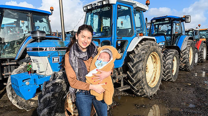 Laura and baby Culainn McCarthy (Bantry) enjoying the sunshine at the recently held Bantry Macra annual Christmas lights tractor run. The run this year was held in memory club member Michael Lynch. All proceeds from the day are in aid of Pieta House and the Samaritans.   (Photo: David Patterson)