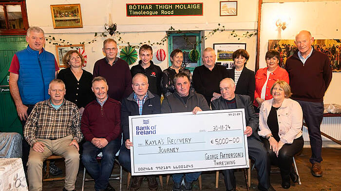 The organisers of the old time threshing that took place in the yard of George Patterson, Ballinacarriga expressed thanks to all those who supported the events.  The proceeds of €5,000 were recently presented by George Patterson to William Shorten for Kayla’s Recovery Journey. Back (from left): Aiden and Mairead O’Driscoll, Keith and Killian Kingston, Diane Desmond, Vincent and Eilish Woods, and Eileen and Charlie Bateman. Front (from left): Vincent Dullea, Micheál Crowley, Sam Kingston, William Shorten, George Patterson, and Helen Kingston. Missing from photo are Pat White and James O’Donovan.  (Photo: Donie Hurley)