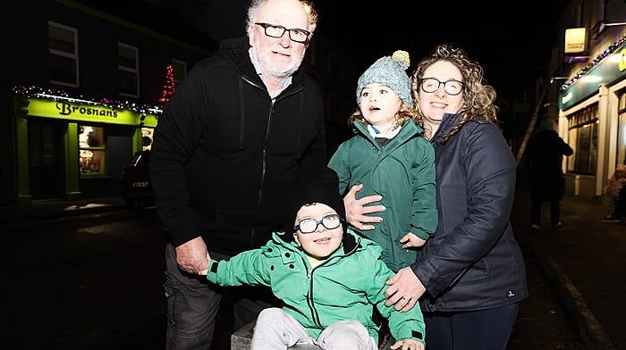 Rory (5) and Cody O'Regan (2) with their mom Tina Darb and grand Uncle Charlie Mc Carthy at the Schull Parade of lights. Carlos Benlayo