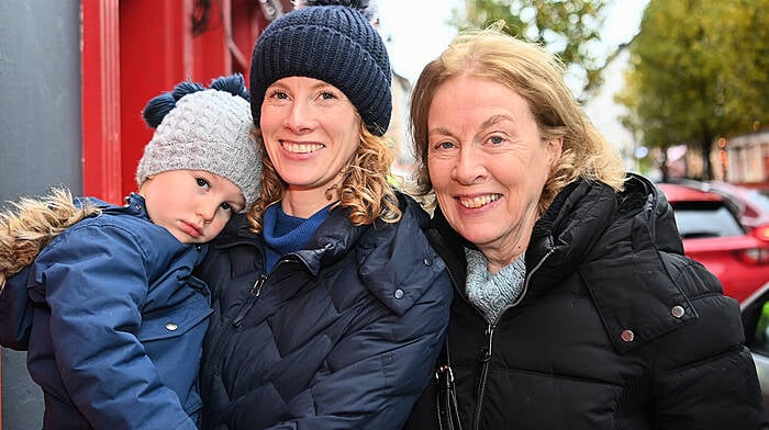 Ardfield’s Tadhg Sutton with Aoife and Mary Delaney out and about in Pearse Street, Clonakilty.  Photo: Martin Walsh.