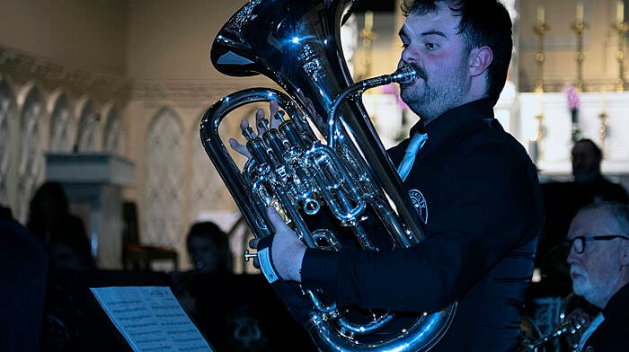 Oscar Leahy O’Donovan, a member of the Clonakilty Brass Band, playing the euphonium during last Friday’s Festive Evening (the Feast of St. Nicholas) in the Sacred Heart Church, Courtmacsherry.  Photo: Martin Walsh.