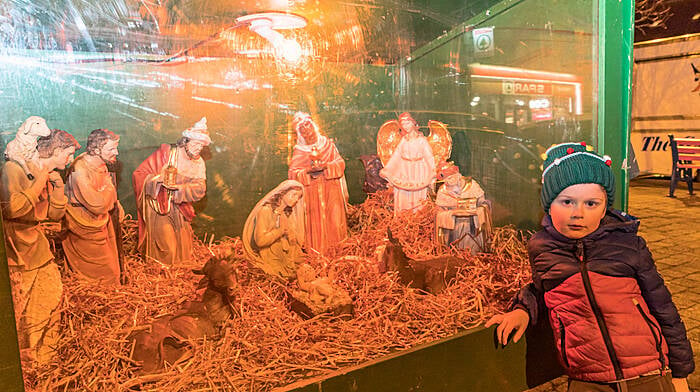 Iarlaith Cronin admiring the crib in Castletownbere Picture: Anne Marie Cronin Photography