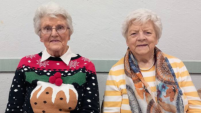 Local ladies Ina Helen and Annie O'Regan look festive as they enjoy the Active Retired Christmas party in Ballinascarthy hall.