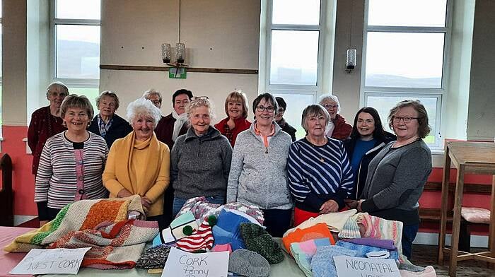 Some of the crafty ladies from the Wednesday morning group at Gortalassa Old School House with a selection of the crafts they are donating ahead of Christmas to three charities, the neo natal unit at CUH, Penny Dinners and West Cork Blankets of Hope.