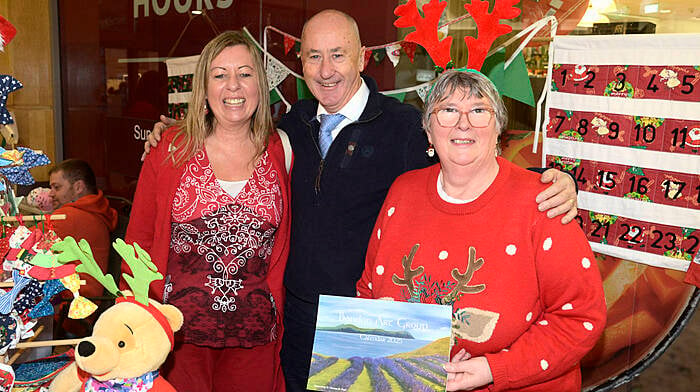 At the Bandon Christmas market at Riverview shopping centre was Cllr Alan Coleman with Isla Jeffers member of Glasslynn choir and Evelyn Drapper, Bandon art group. Photo: Denis Boyle