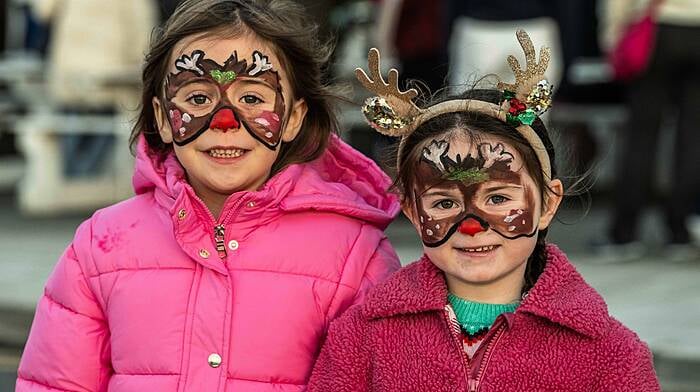 Angela O'Regan and Alannah Goggin, both from Baltimore, had their faces painted to celebrate the recent events. Photo: Andy Gibson.