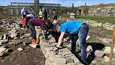 West Cork locals continuing the tradition of building dry stone walls Image