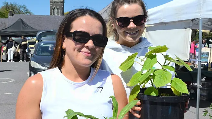 Emma and Shelley Daly, Castlehaven enjoying the gorgeous sunshine at Skibbereen's Farmers Market last Saturday. Photo; Anne Minihane.