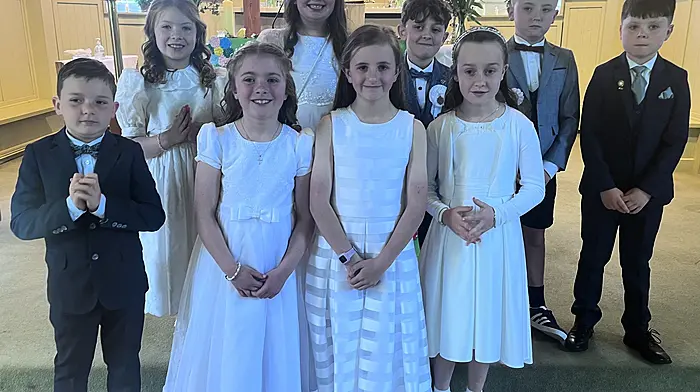 Clogagh National School pupils enjoyed a very special day last Saturday when they received their First Holy Communion in Clogagh Church with celebrant Fr John Kingston. From left: Donnacha Ryan, Muireann O'Leary, Saoirse Coomey, Annie Mosely, Laura Deasy, Liam McCabe, Natalie Nyhan, Joe Hanrahan, and Tomas O'Reilly.