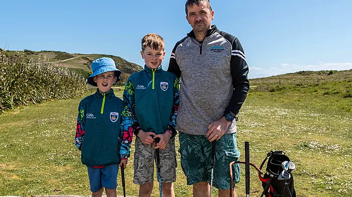 Enjoying a round of Pitch and Putt at the Warren Beach course in the fabulous weather over the bank holiday weekend were (from left): Maitíu, Hugh, and Pádraig O'Donovan from Rosscarbery.   (Photo: Andy Gibson)