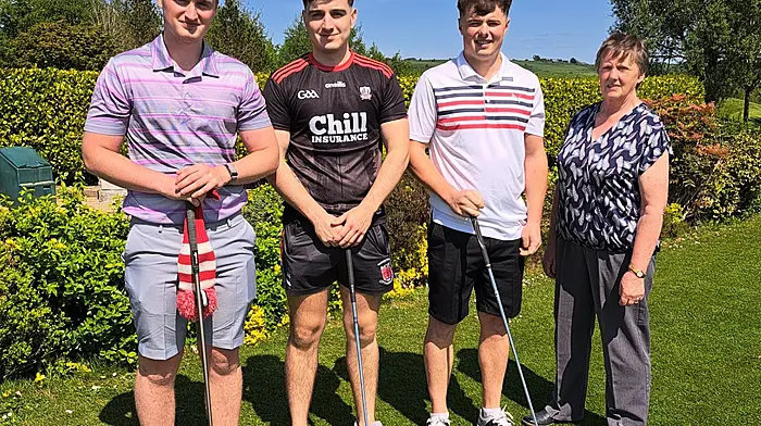 Courcey Rovers players (from left): Jack O’Callaghan, Niall Moloney, and Martin Collins with Margaret O’Brien (committee) at the Courcey Rovers golf classic which was held last week at Kinsale Golf Club.