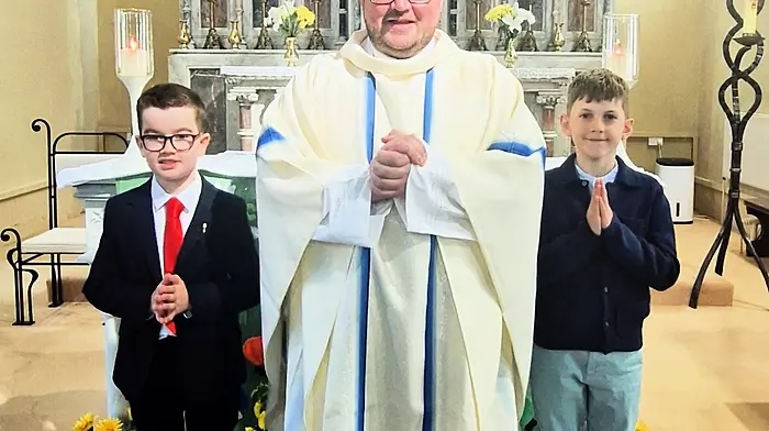 Fr Ben Hodnett with Sean O'Mahony and Hugo Arundel, pupils of Rusnacahara National School in Ahakista, who received their First Holy Communion at the Sacred Heart Church Durrus on Sunday May 4th.