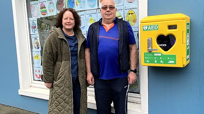 Maura Mannix Secretary and Donal Shorten Chairperson of the Ballineen and Enniskeane Christmas Lights at Drinagh Pharmacy, Main St. Ballineen.