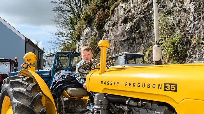 Evan Collins (2) (Clonakilty) checking out a Massey Ferguson 35 at the Leap tractor and car run which was held on a nice sunny Easter Bank Holiday Monday. The run was in aid of Bru Columbanus.
Picture: David Patterson, Tractor Run – Cork