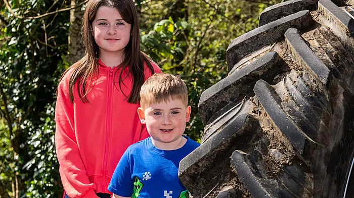 Orla and Noah Collins from Leap at the Leap & District Vintage Club  annual Tractor & Car run. Right: Rian Hayes, Reenascreena and Eoin Doolan, Connonagh. (Photos: Andy Gibson)