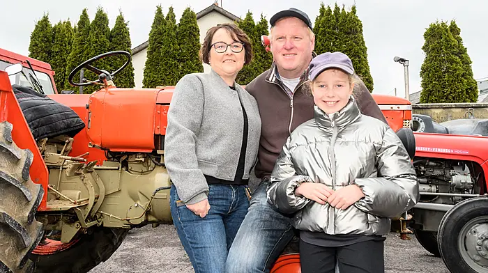 Margaret, Martin and Mollie-Kate McCarthy (Drimoleague), enjoying their day at the Drimoleague tractor, truck and car run. The run was held in aid of West Cork Rapid Response and Bantry Hospice. (Photo: David Patterson)