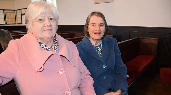 Nuala Fitzgerald and Claire Kenneally enjoying the wonderful singing from  St George's Church Choir, Belfast at St Barrahane’s Church in Castletownshend last Friday evening. The proceeds from the concert will go towards the restoration fund for the church. (Photo: Anne Minihane)