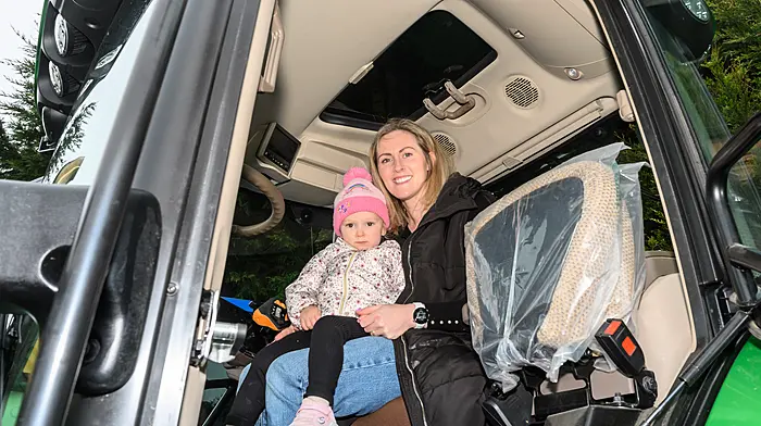 Ciara (2) and Maura Loughnan (Ring) enjoying their day at the Lisavaird Rosemary Calnan memorial tractor, truck and car run. The proceeds will go to Cancer Connect and Lisavaird National School.  (Photo: David Patterson)