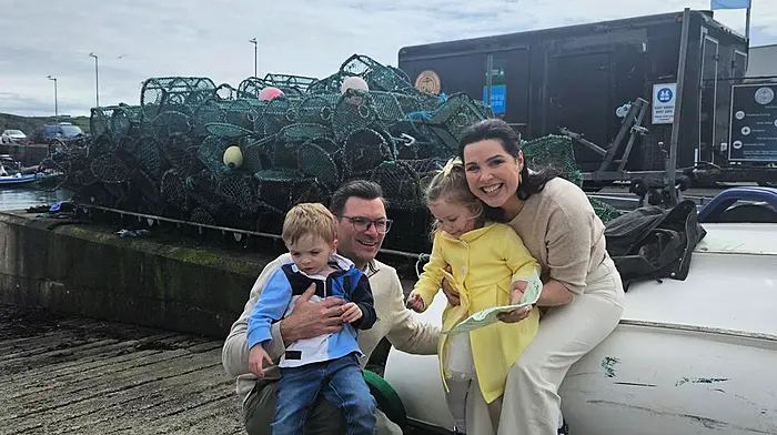 Caption.  XXXXX The O’Regan family, Edel and Richard with children Daniel and Emily  as they discover clue number 10-  'It's here you'll find boats on trailers.  Reverse then launch, farewell sailors.’ at the Easter Sunday treasure hunt