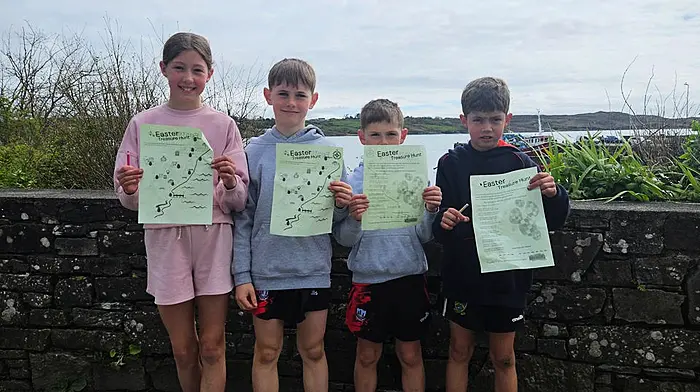 Caption Kayla Cleary, Padraig McCarthy, Cormac McCarthy and Timmy Cleary each armed with their route map and clues for the Easter  Treasure hunt in aid of Schull’s August Regatta pier side amusements.