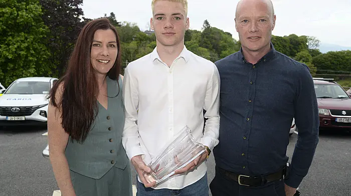 Overall award winner Evan Collins from Skibbereen with his parents Tom and Laura.