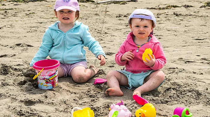 Left: Sarah and Rosie Harrington from Caheragh at Harbour View Beach. Right: Suzanna Donovan and Rachel O'Boyle from Leap at the annual fiddle fair in Baltimore. (Photos: Andy Gibson & Denis Boyle)