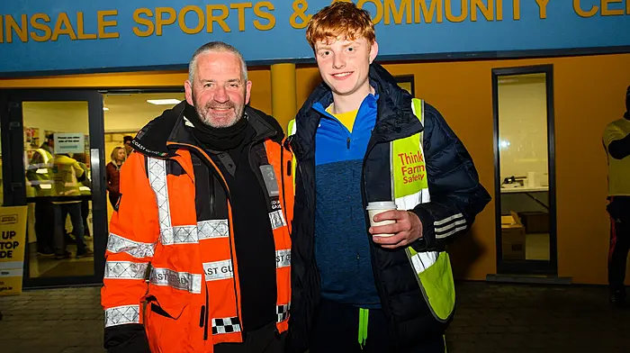 John Martin-Nyhan, volunteer from the Coastguard and steward Miah O’Callaghan at the walk in Kinsale. (Photo: John Allen)
