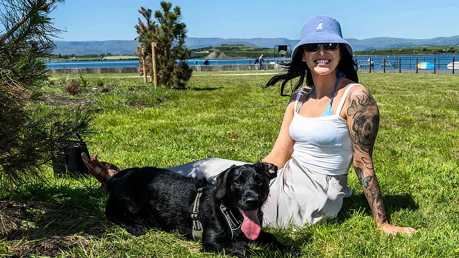 Making the most of the hot and sunny day in Bantry was Lauren Miller from Bandon with her dog 'Stanley'. Picture: Andy Gibson.